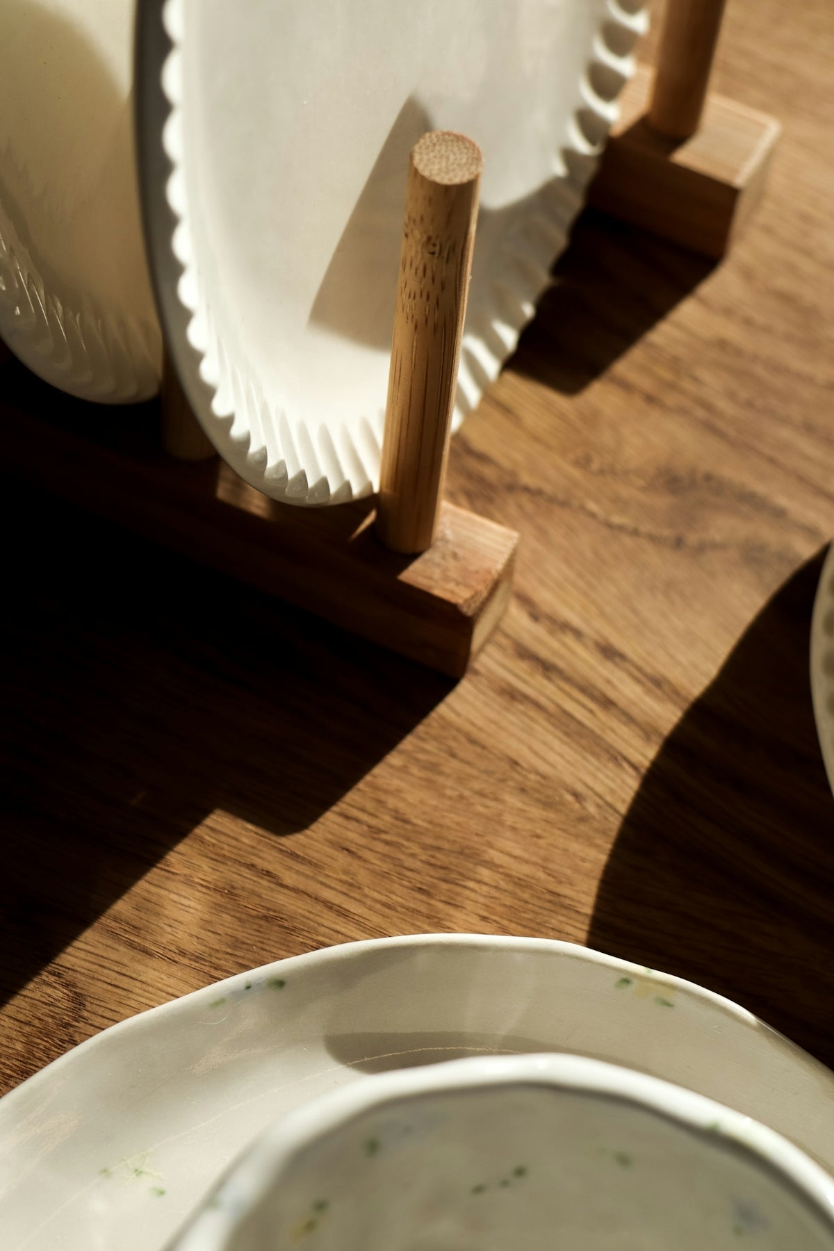 a close up of a plate on a wooden table