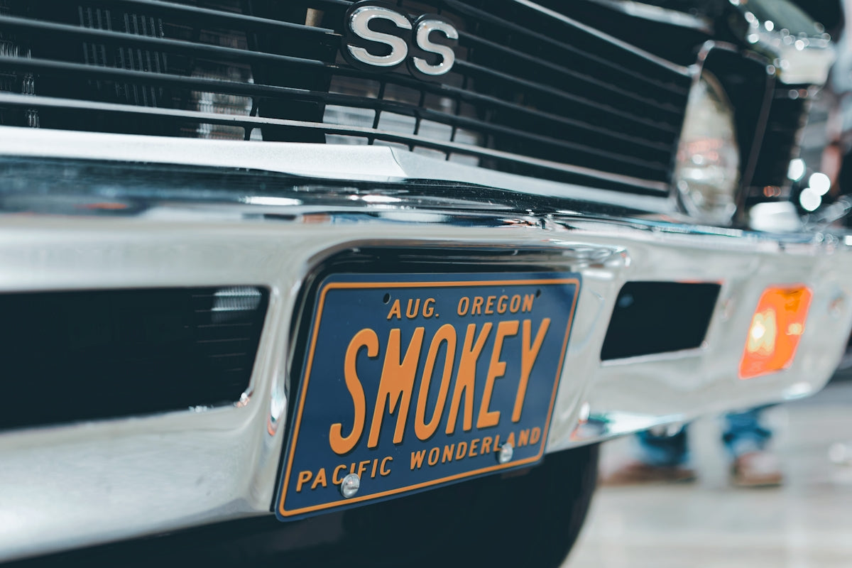 Classic car with smokey license plate