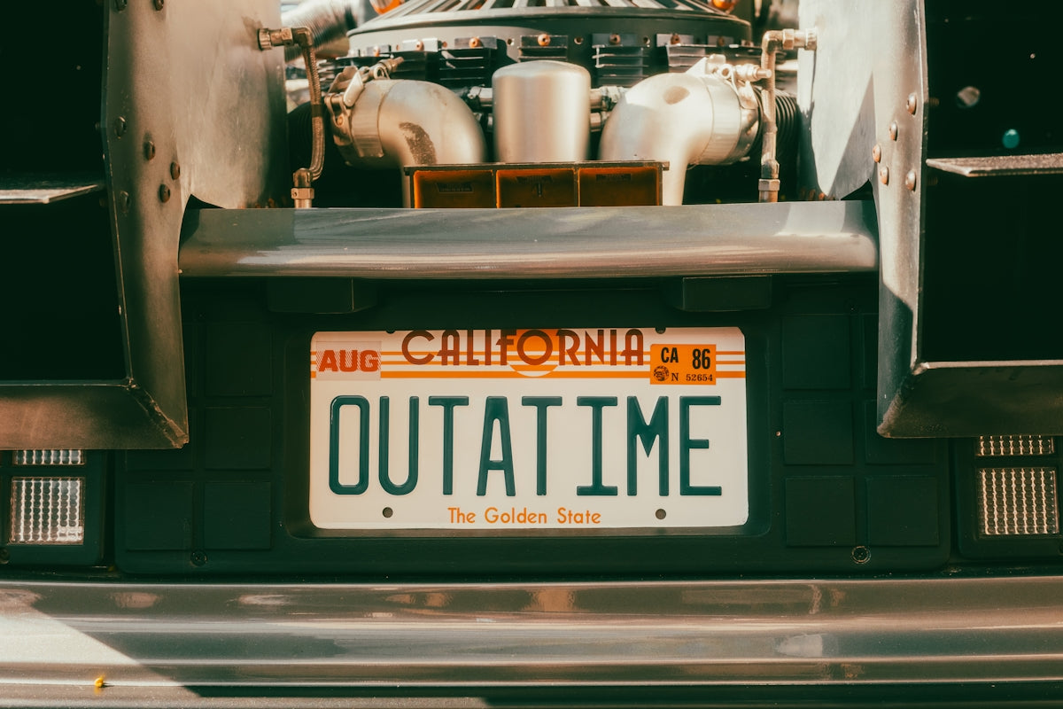 California license plate reads outatime.