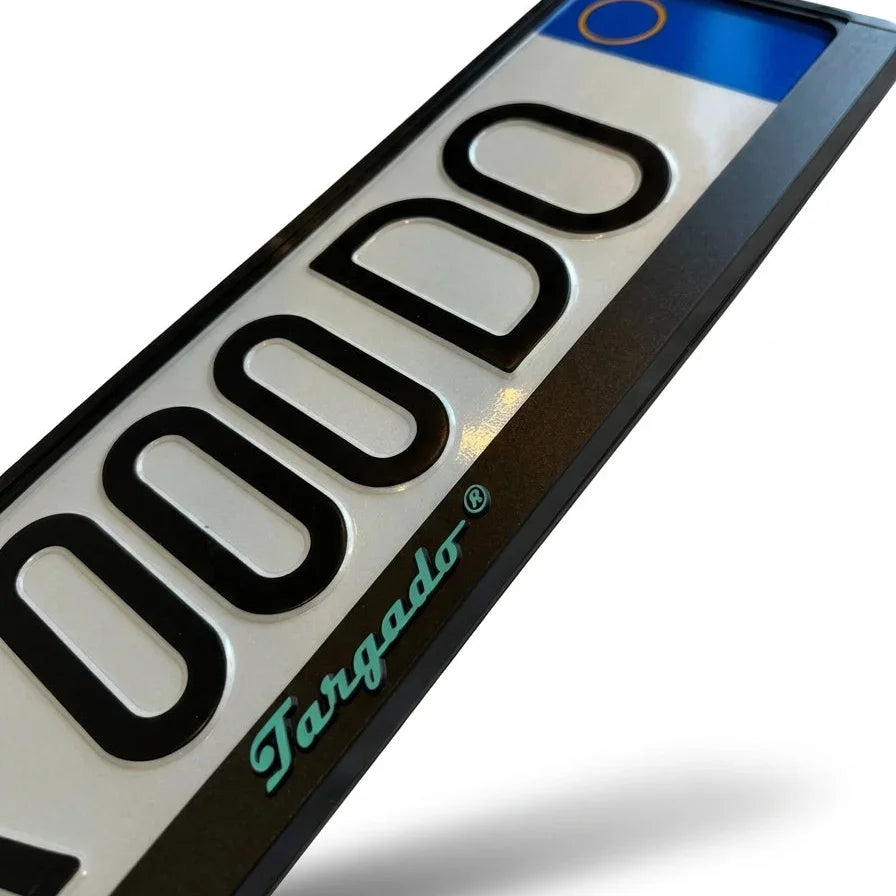 Close-up of Targado Srl Model Mamba license plate holder with green logo.