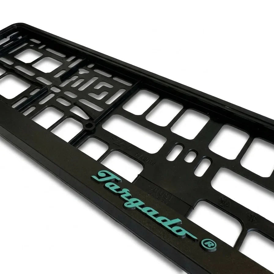 Close-up of the Model Mamba license plate holder by Targado Srl with a green logo