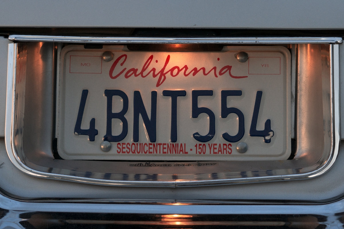 A california license plate with the word california on it